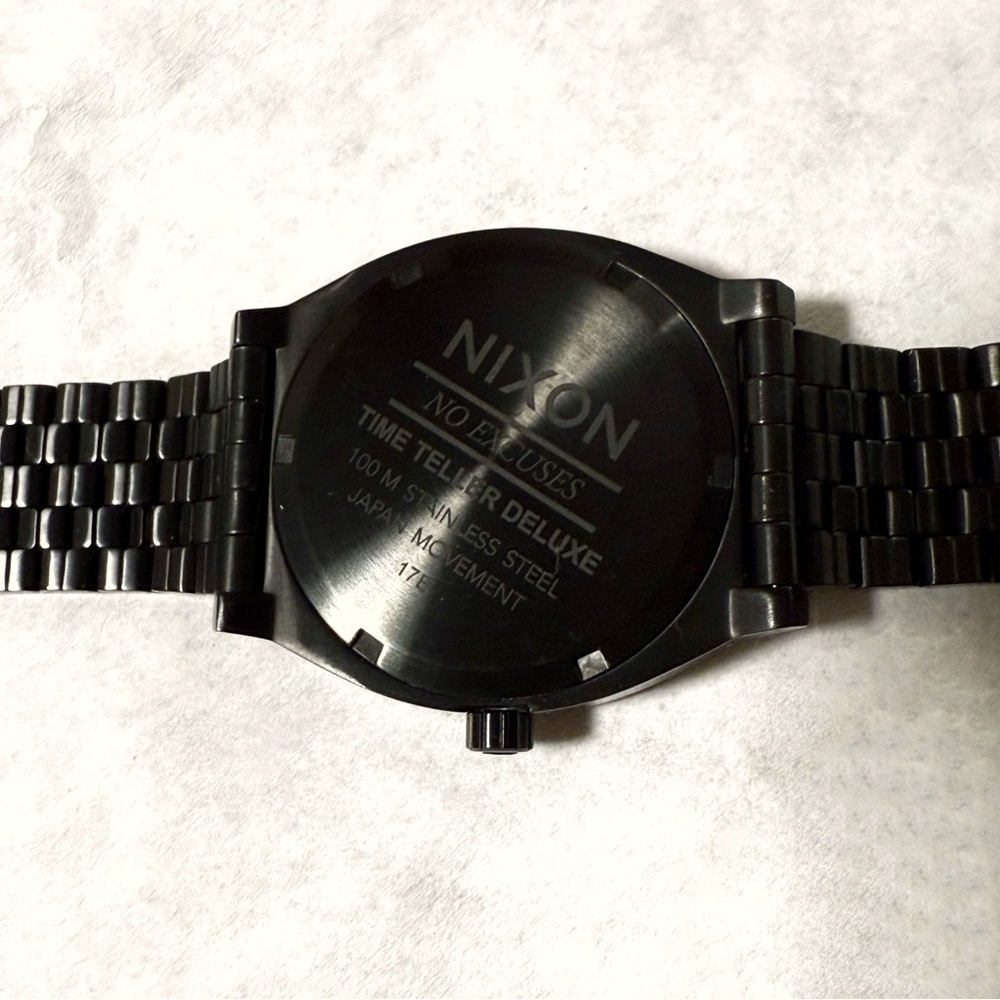 NIXON THE TIME TELLER DELUXE ALL BLACK MINIMALIST WRIST WATCH tells day & date - Picture 6 of 8